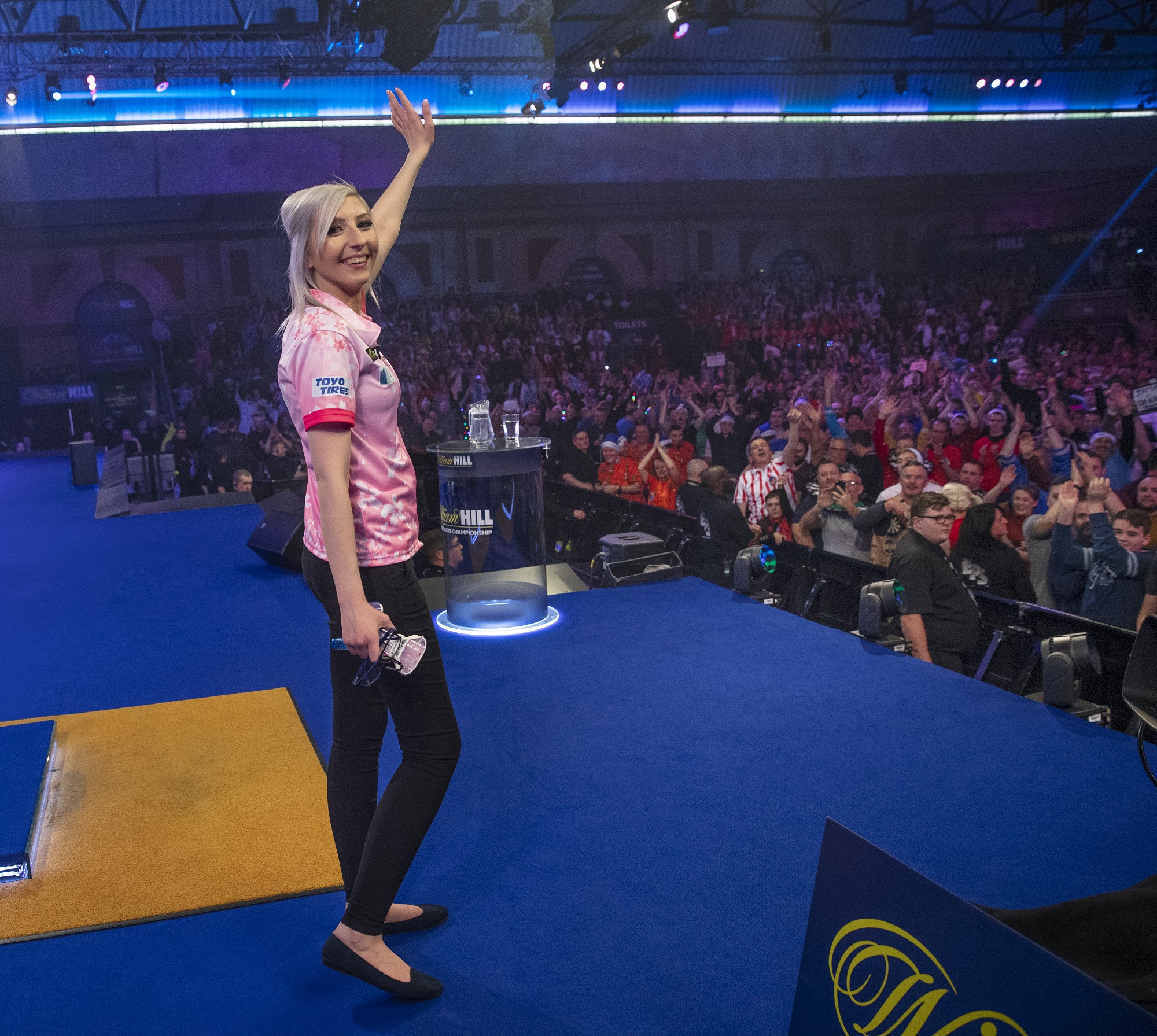 Fallon Sherrock on stage at the World Darts Championship.