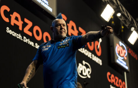 Peter Wright celebrates winning Cazoo Premier League night one in Cardiff. Credit ; Steven Paston/PDC