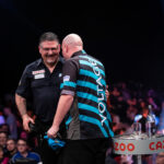 Cross writes his name in the history books on day two at the Masters as van Gerwen, Smith and Wright all join him in the quarter-finals