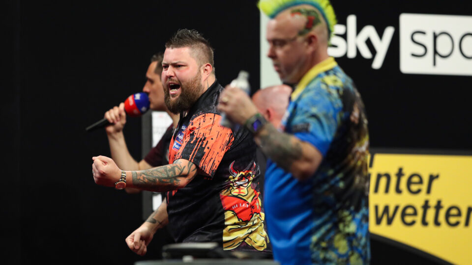 Michael Smith on Peter Wright frosty handshake  ” He took his frustrations out one”