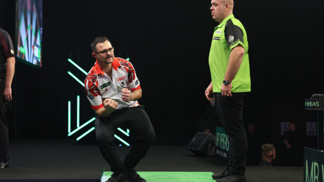 Heta dumps out van Gerwen as Buntz’s fairytale continues on a drama-filled night at the Grand Slam.
