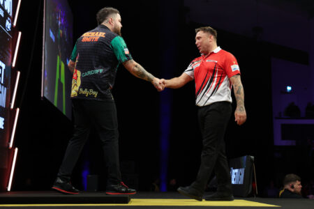 Michael Smith and Gerwyn Price on stage in the 2024 Premier League Darts.