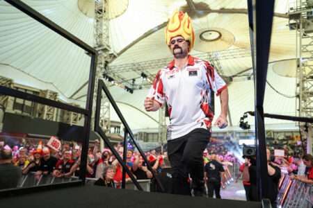 Damon Heta walking on stage