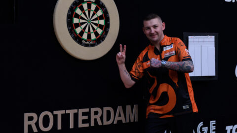 Aspinall remains in Premier League Darts Play-Off places with victory in Rotterdam