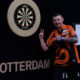 Nathan Aspinall celebrates his nightly win in Rotterdam in the 2024 Premier League Darts.