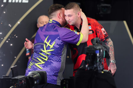 Luke Littler and Nathan Aspinall on stage during the 2024 BetMGM Premier League Darts.