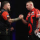 Nathan Aspinall and Michael Smith on stage in the 2024 BetMGM Premier League Darts.