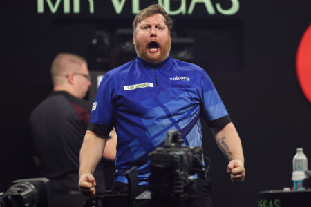Cameron Menzies celebrating on stage