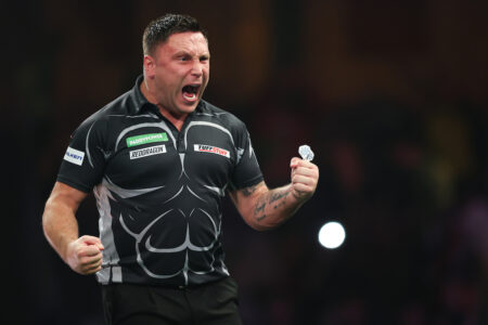 Gerwyn Price celebrates winning a match at the 2025 Paddy Power World Darts Championship.
