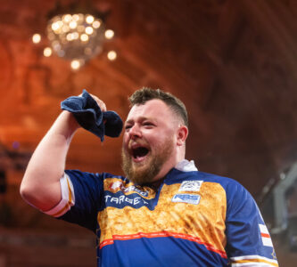 Josh Rock on stage at the World Matchplay.