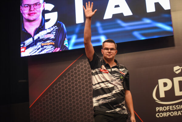 Raymond van Barneveld keeps his World Grand Prix fate in his own hands as Chisnall hangs by a thread 