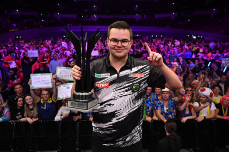 Gian van Veen holding the European Championship trophy.