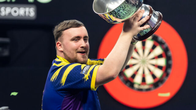Littler Defeats Humphries to Retain Grand Slam Title and Become World Number One