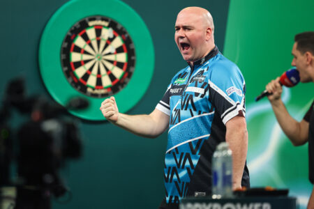 Rob Cross on stage during the Paddy Power World Darts Championship.