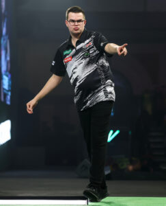 Gian van Veen on stage at the World Darts Championship.