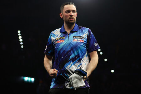Luke Humphries on stage during the 2026 Premier League Darts