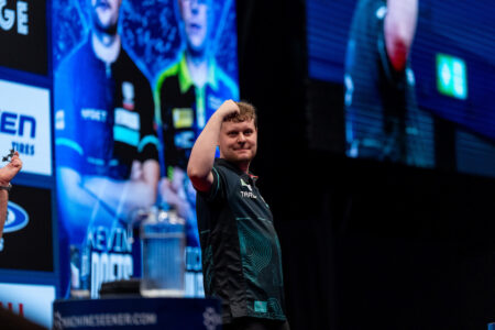 Kevin Doets on stage celebrating during the 2026 European Championship.