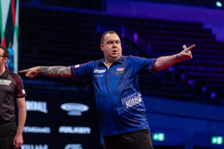 Kim Huybrechts celebrates on stage at the 2026 European Championship.