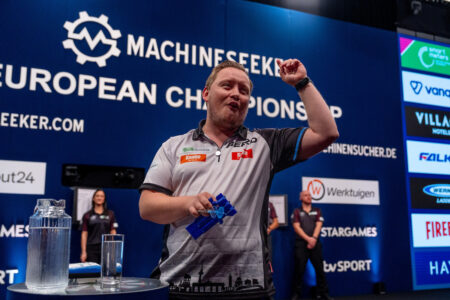 Martin Schindler celebrates on stage during the 2026 European Championship.