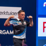 Price and Van Veen through as Woodhouse pings nine darter at European Championship