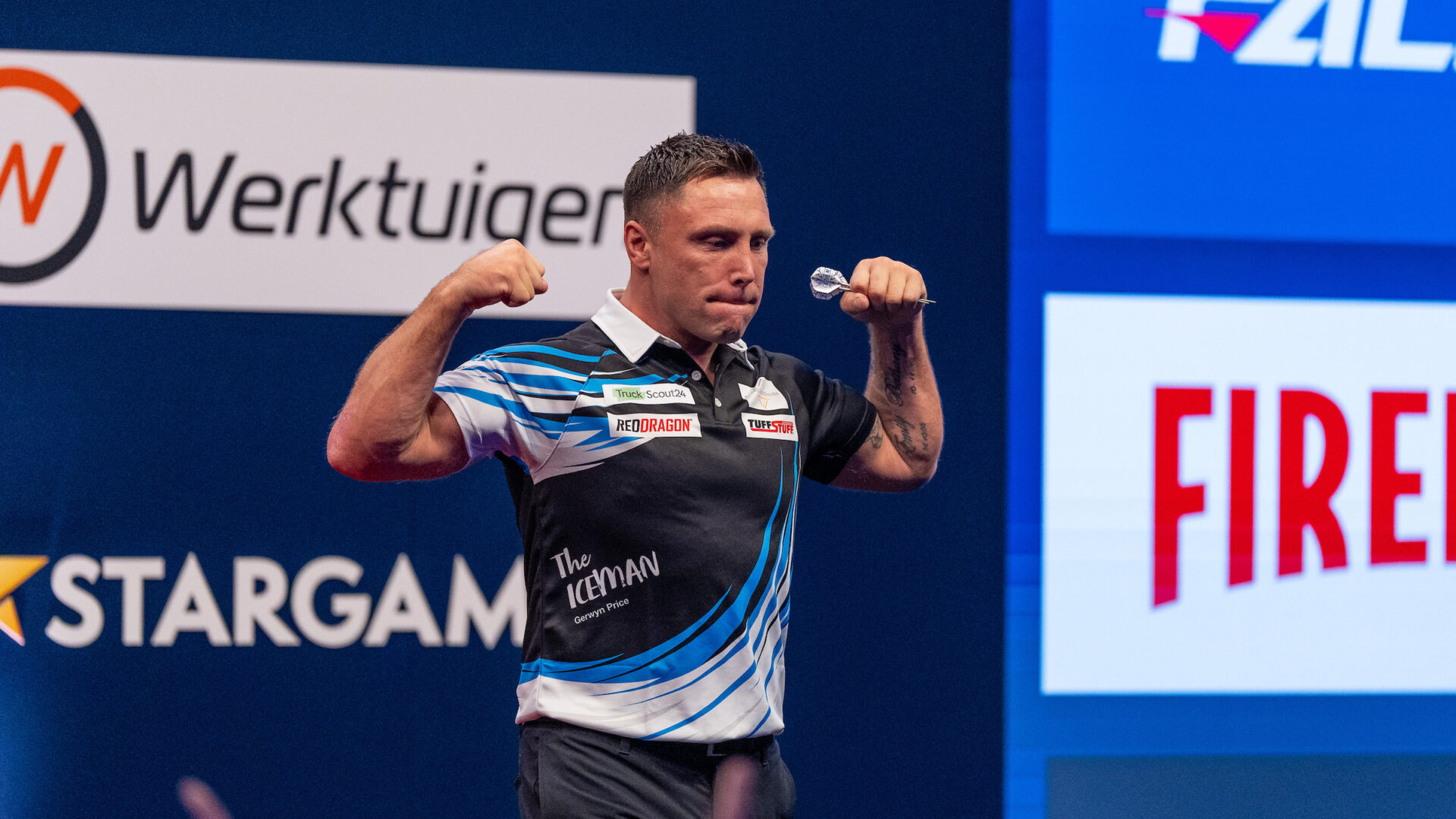Gerwyn Price celebrates on stage at the 2026 European Championship.