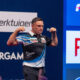 Gerwyn Price celebrates on stage at the 2026 European Championship.