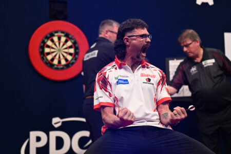 Damon Heta celebrates on stage at the 2026 European Championship.