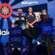 Gerwyn Price celebrates on stage at the 2026 World Grand Prix.
